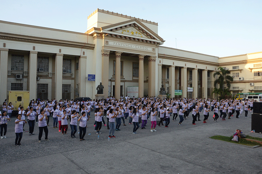 Capitol employees participate in the zumba session held at Capitol grounds as part of the Women's month celebration. (Photos by Jun Jaso, Pamp PIO)